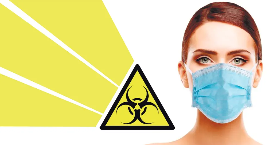 Air quality warning: woman wearing a protective mask beside a biohazard symbol
